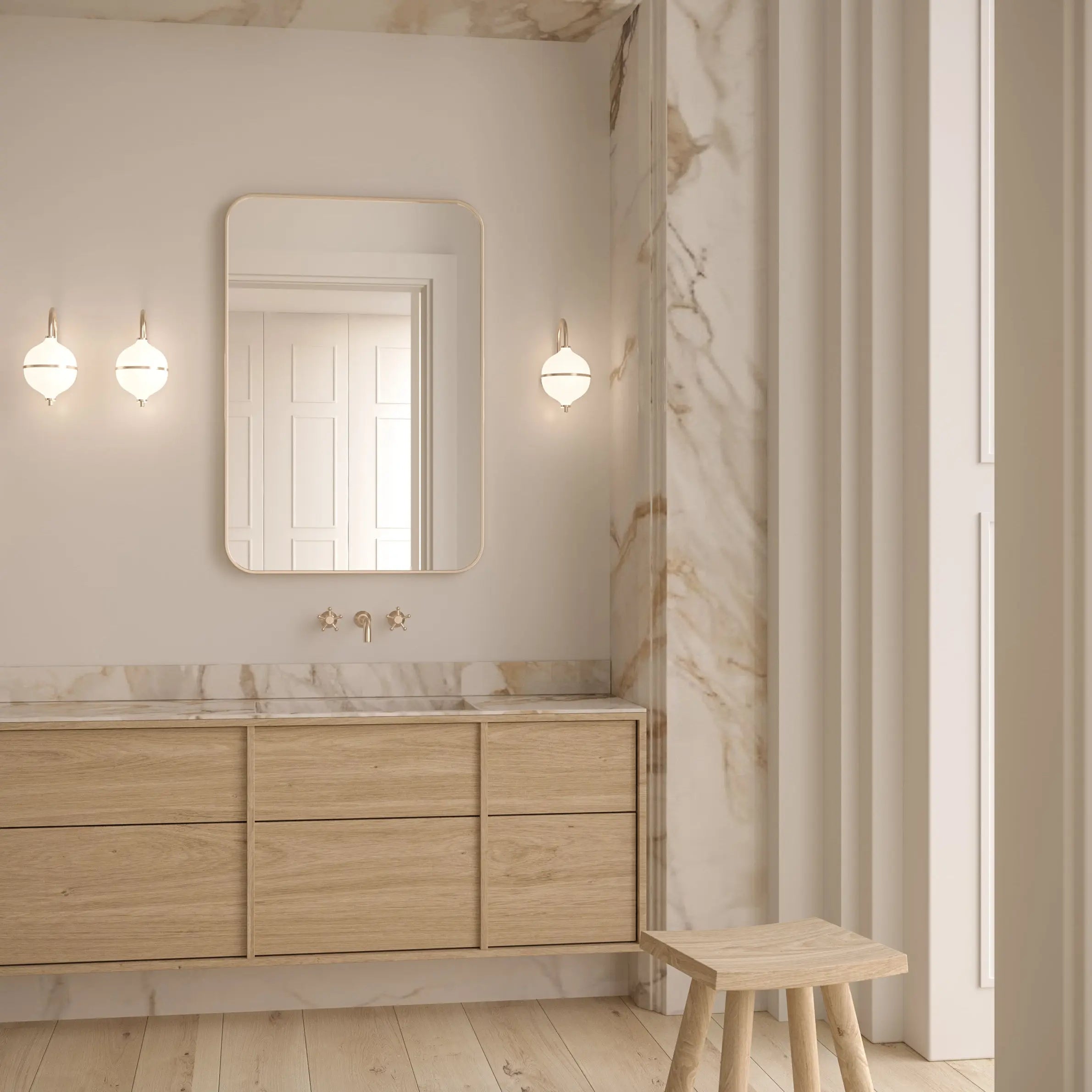 Bathroom with wooden vanity, mirror, and light fixtures.