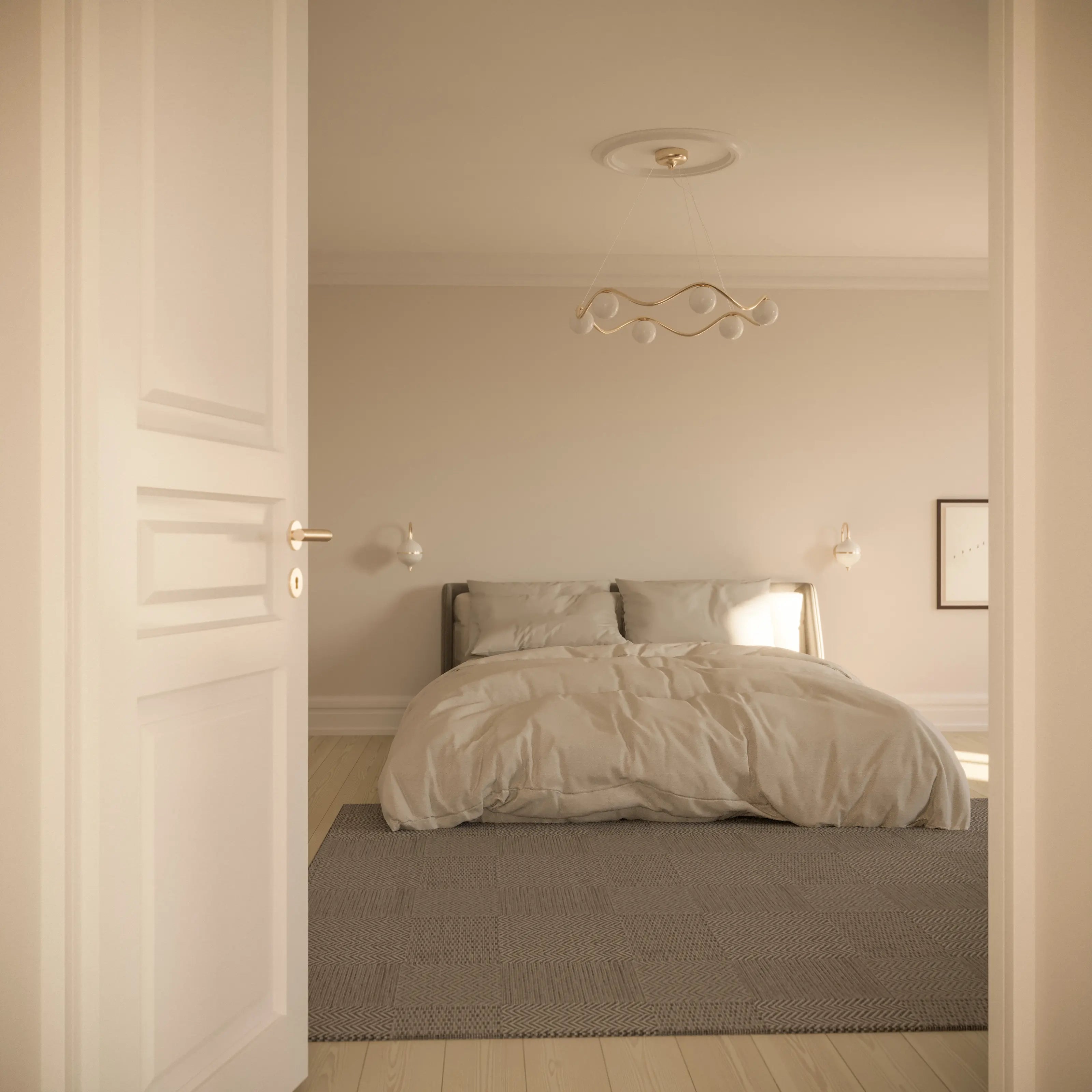 Neatly made bed in a bedroom with neutral tones