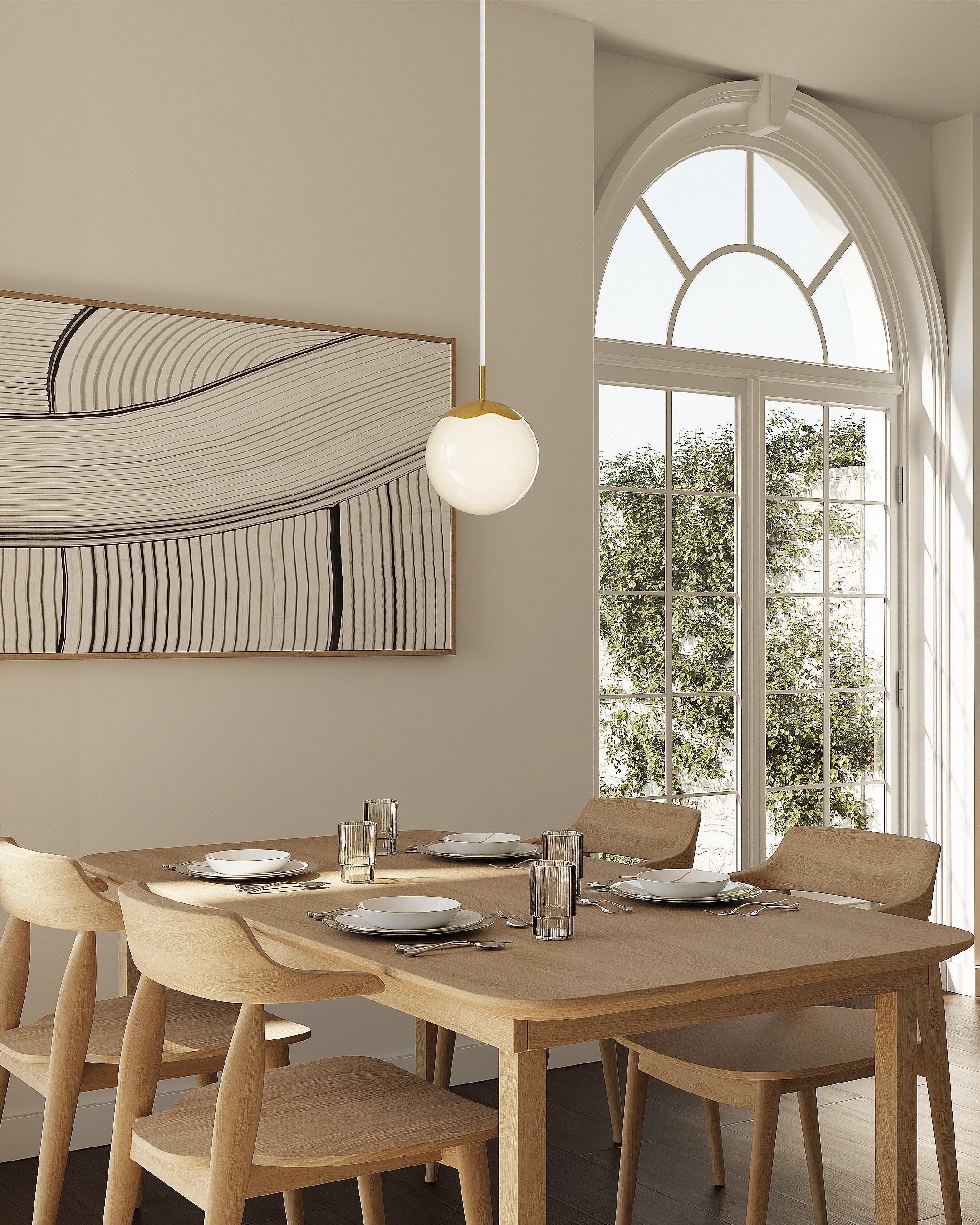 Dining room with wooden table and chairs, large window, and abstract wall art.