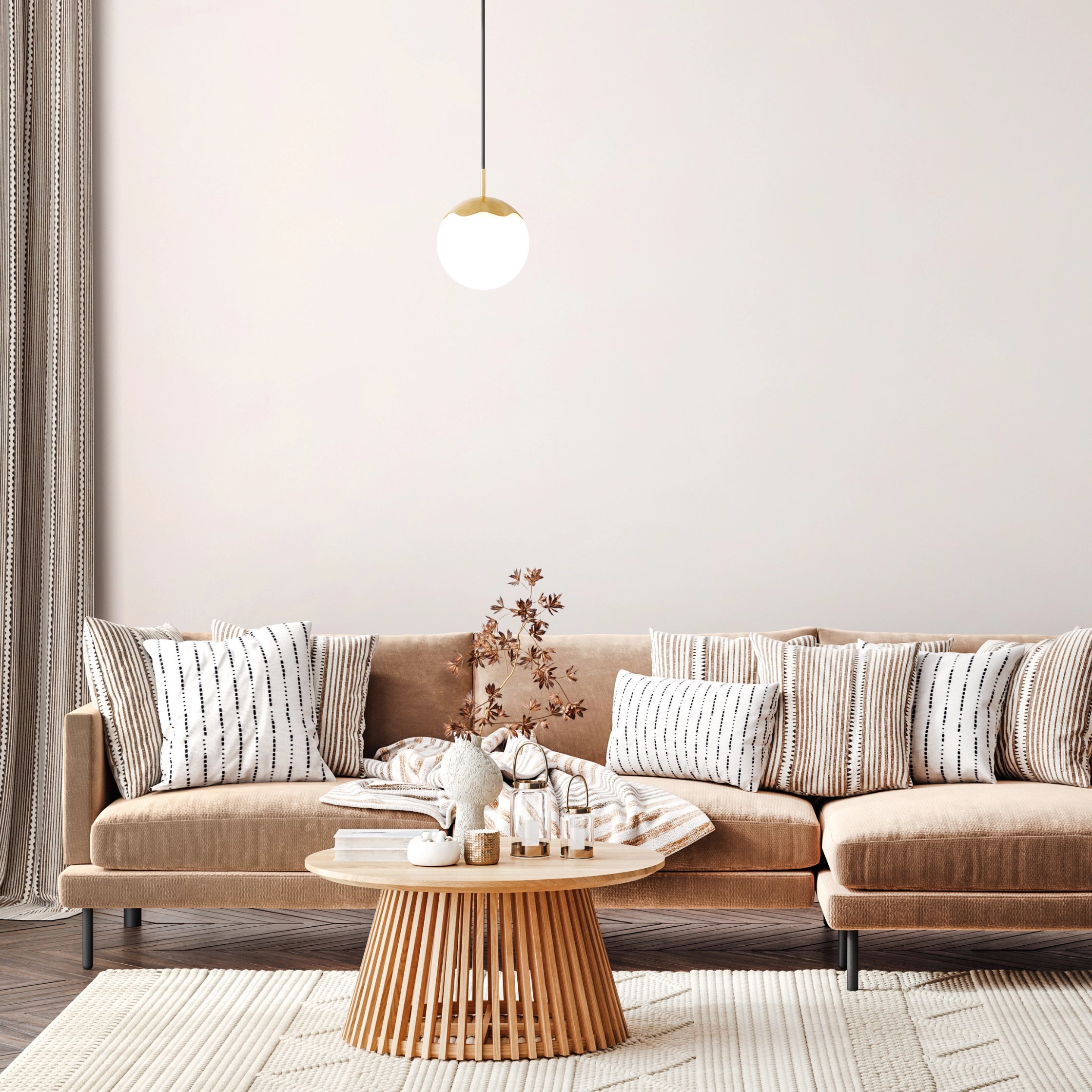 Modern living room with a beige sectional sofa, wooden coffee table, and decorative elements.