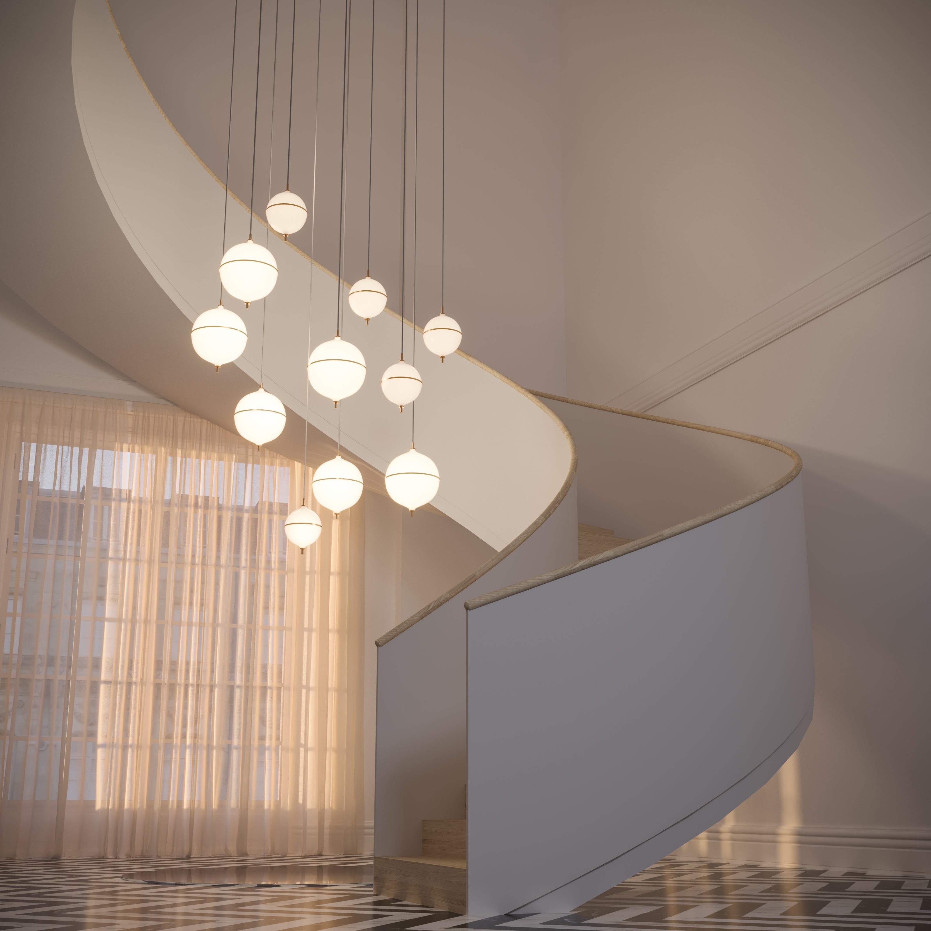 Grand staircase chandelier with sculptural elegance, soft glow illumination, handcrafted glass, and brass accents.